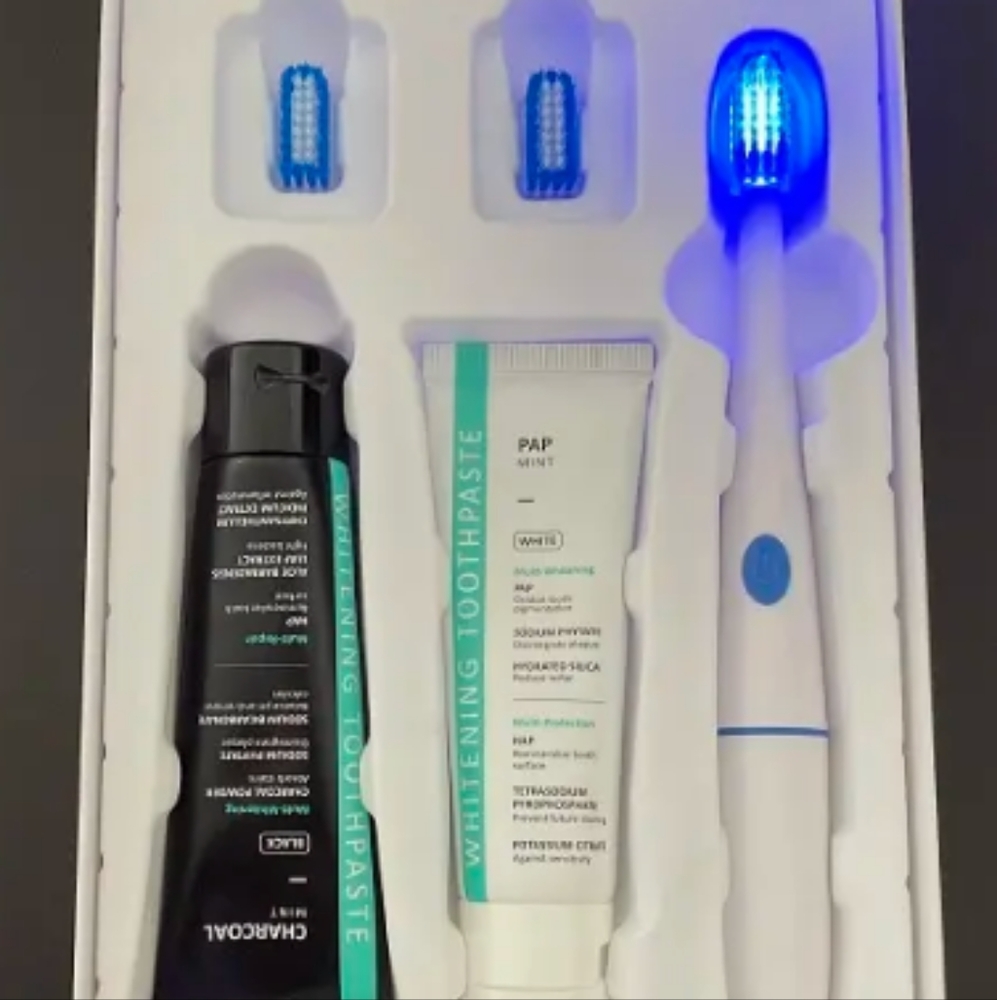 Teeth Whitening Kit: led toothbrush and activated charcoal toothpaste